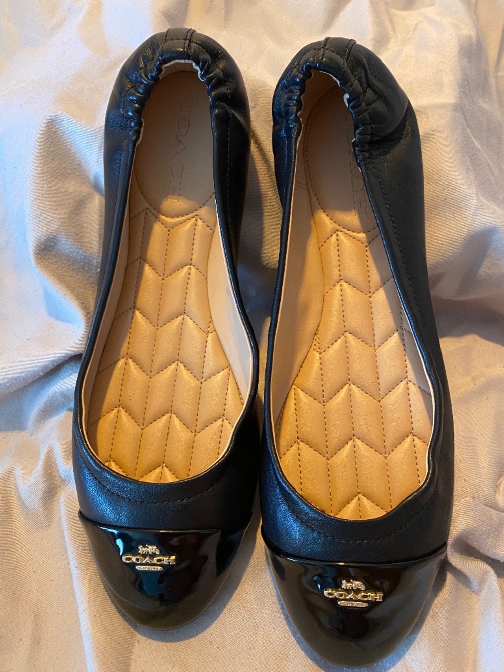 Coach women’s black footwear